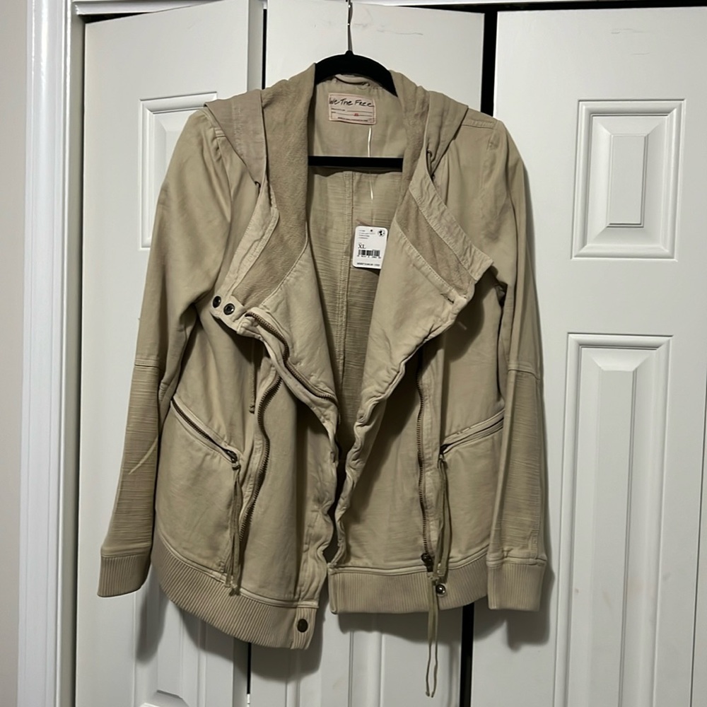 Brand new, Free People zipper jacket with hood. Versatile looks